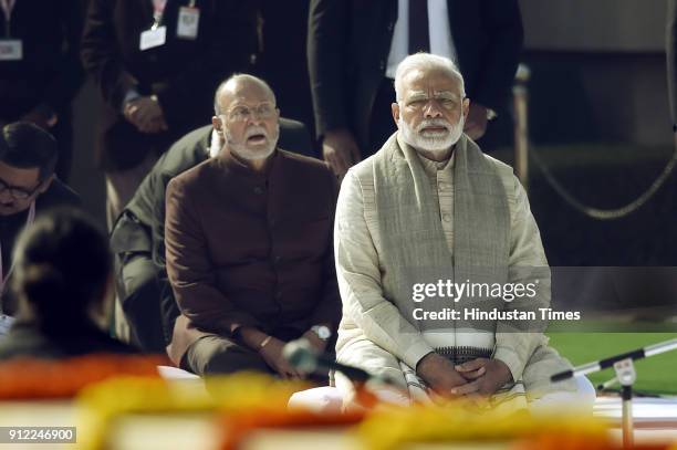 Prime Minister Narendra Modi with Lt Governor of Delhi Anil Baijal attends an all religion prayer meeting to pay homage to Mahatma Gandhi on his 70th...