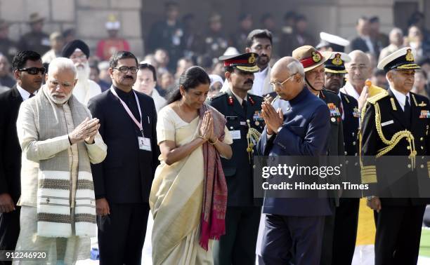 President Ram Nath Kovind with Prime Minister Narendra Modi and Vice President Venkaiah Naidu after paying homage to Mahatma Gandhi on his 70th death...