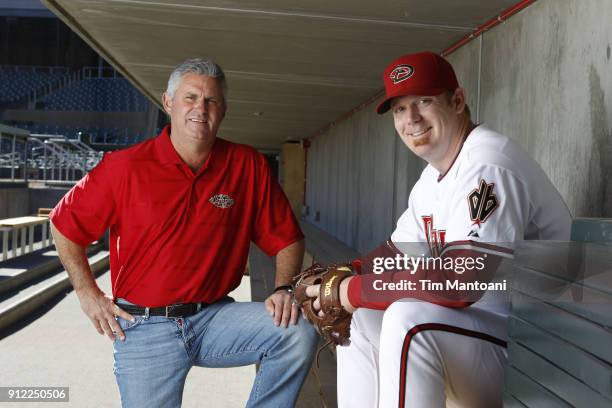Portrait of Arizona Diamondbacks pitcher J.J. Putz with general manager Kevin Towers during spring training photo shoot at Salt River Fields at...