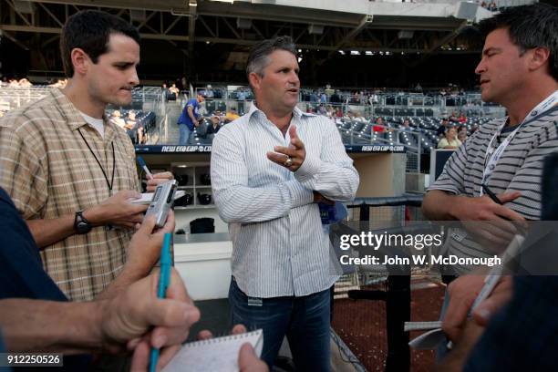 View of San Diego Padres general manager Kevin Towers on field with reporters before game vs Los Angeles Dodgers at Petco Park. San Diego, CA...
