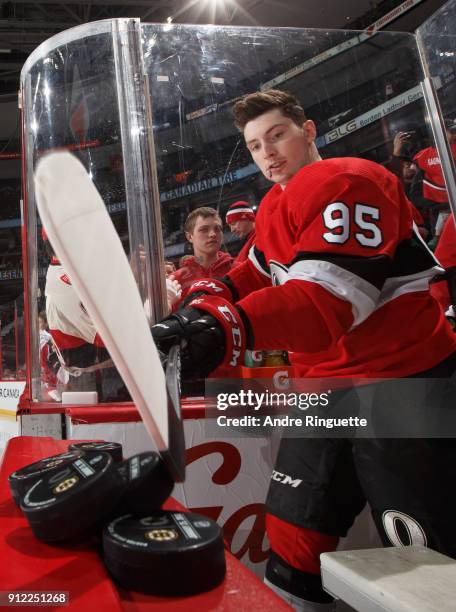 Matt Duchene of the Ottawa Senators knocks over a stack of pucks for warmup prior to a game against the Boston Bruins at Canadian Tire Centre on...