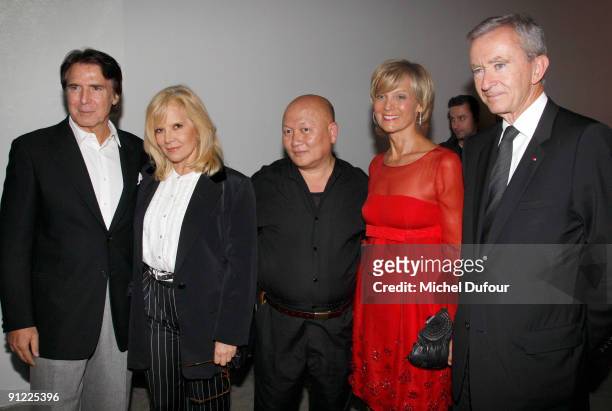 Tony Scotti, Sylvie Vartan, Tyen, Helene Mercier Arnault and Bernard Arnault attend "Tyen: 30 Years of Creation" cocktail celebration at Palais de...