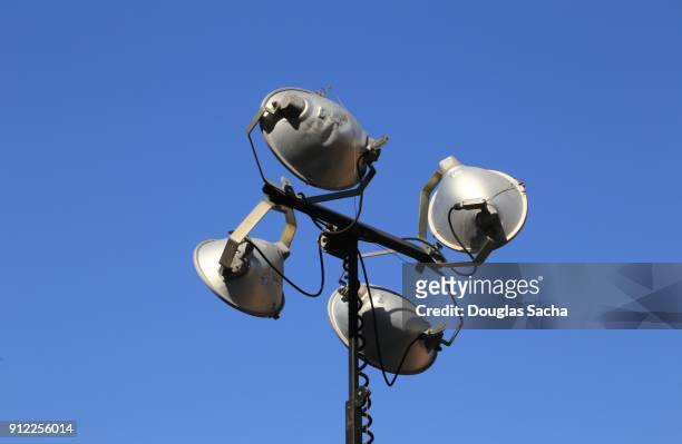 directional outdoor lighting on a overhead mast pole - traffic light control box stock pictures, royalty-free photos & images