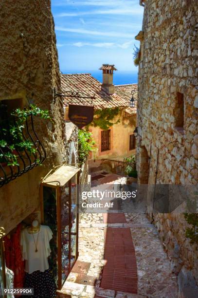 streets of the medieval village of eze, eze, french riviera, france - eze village fotografías e imágenes de stock