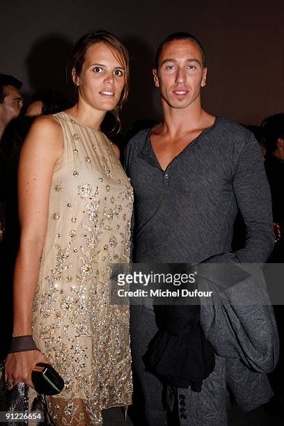 Laure Manaudou and Fred Bousquet attend "Tyen: 30 Years of Creation" cocktail celebration at Palais de Tokyo on September 28, 2009 in Paris, France.