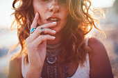 Young woman wearing bohemian style silver jewelry