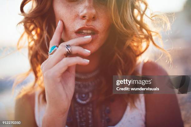 young woman wearing bohemian style silver jewelry - silver ring stock pictures, royalty-free photos & images