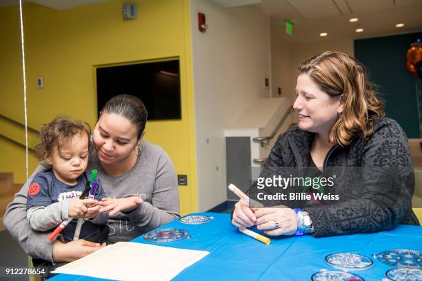 Kairo plays with arts and crafts during the Light Up Our Hospital campaign kick-off with OSRAM at Boston Children's Hospital on January 29, 2018 in...
