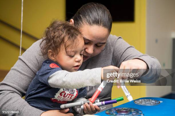 Kairo plays with arts and crafts during the Light Up Our Hospital campaign kick-off with OSRAM at Boston Children's Hospital on January 29, 2018 in...