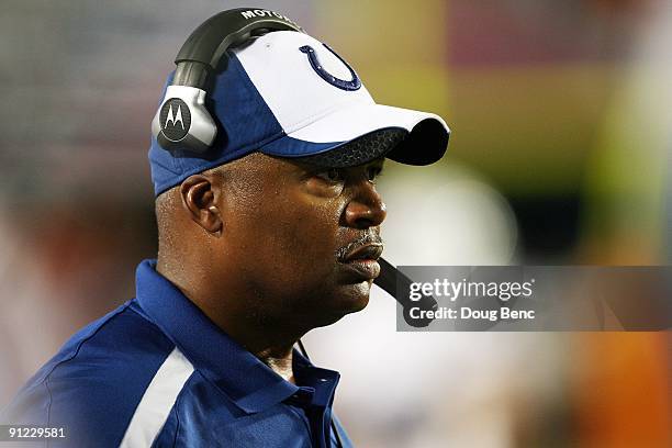 Head coach Jim Caldwell of the Indianapolis Colts watches his team take on the Miami Dolphins at Land Shark Stadium on September 21, 2009 in Miami,...