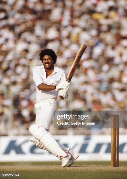 India batsman Kapil Dev pulls a ball during a Nehru Cup match against West Indies on October 23, 1989 in Delhi, India.