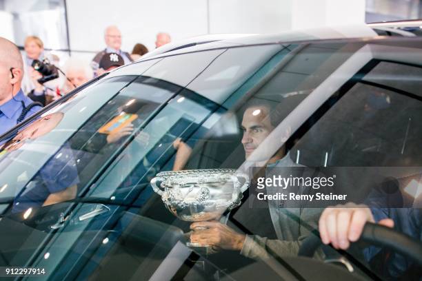 Roger Federer arrives at Airport Kloten with his trophy after winning the 2018 Australian Open Men's Singles Final on January 30, 2018 in Zurich,...