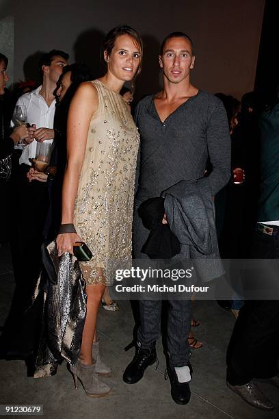 Laure Manaudou and Fred Bousquet attend "Tyen: 30 Years of Creation" cocktail celebration at Palais de Tokyo on September 28, 2009 in Paris, France.