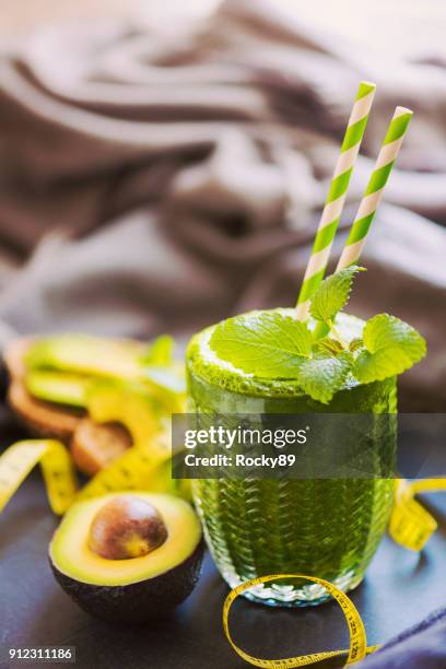 green smoothie - chlorella stock pictures, royalty-free photos & images
