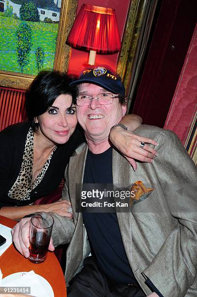 Singer Liane Foly and director Jean Marie Poire attend the Patrick Goavec Birthday Party at the Berkeley Club on September 14, 2009 in Paris, France.