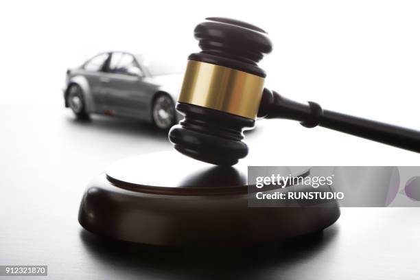 gavel and model car - versteinerung stock-fotos und bilder