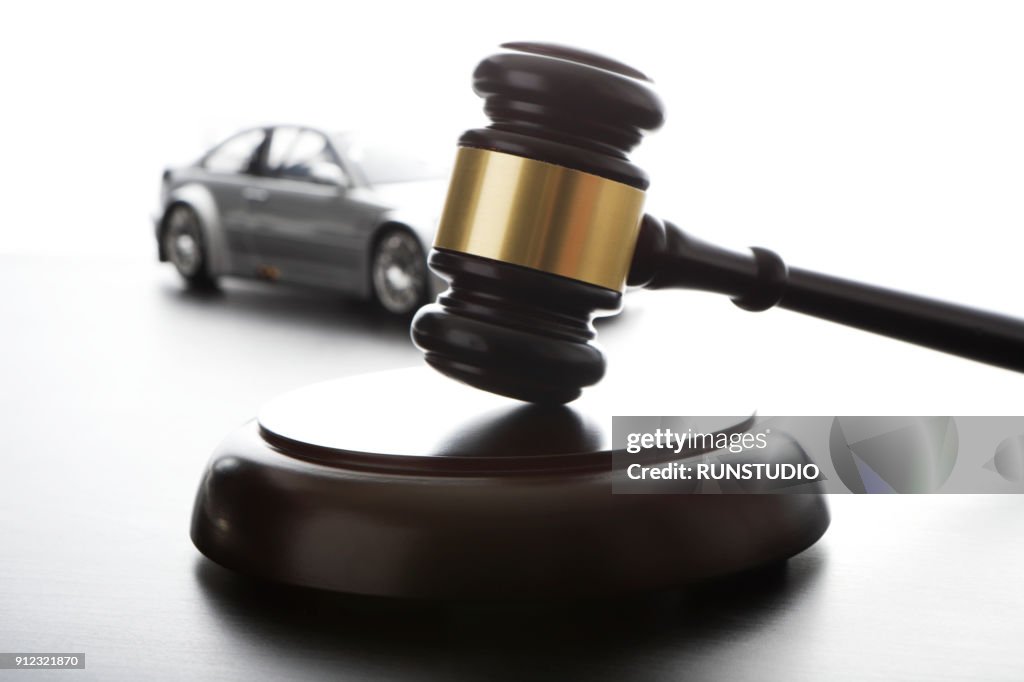 Gavel and model car