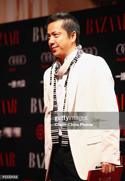 Wang Zhonglei, the president of Huayi Brothers Media Corporation, attends the 2009 BAZAAR Charity Auction Gala on September 28, 2009 in Beijing,...