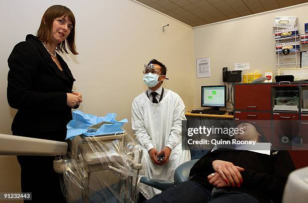 The Minister for Health and Ageing, Nicola Roxon visits Tran Le as she is operated on. The minster is visiting The Royal Dental Hospital Melbourne as...
