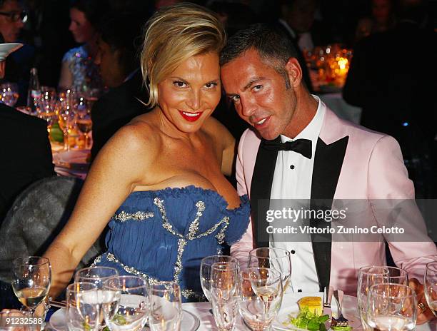 Simona Ventura and Dan Caten attend amfAR Milano 2009 Dinner, the Inaugural Milan Fashion Week event at La Permanente on September 28, 2009 in Milan,...