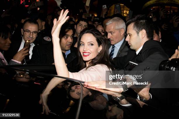 Actress Angelina Jolie leaves the 'Guerlain' store on the Champs-Elysees avenue on January 30, 2018 in Paris, France.