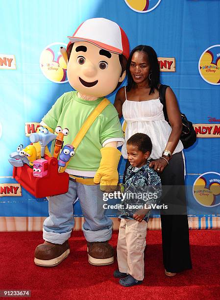 Actress Angela Bassett and her son Slater Vance attend the premiere of "Handy Manny Motorcycle Adventure" at ArcLight Cinemas on September 26, 2009...