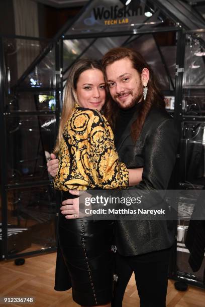 Marina Hoermanseder and Riccardo Simonetti attend the Wolfskin Tech Lab x Gianni Versace retrospective opening event at Kronprinzenpalais on January...