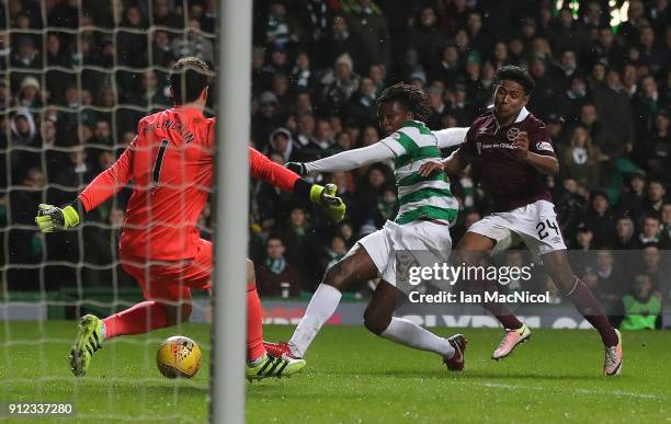 Dedryck Boyata of Celtic scores his team's second goal during the Scottish Premier League match between Celtic and Heart of Midlothian at Celtic Park...