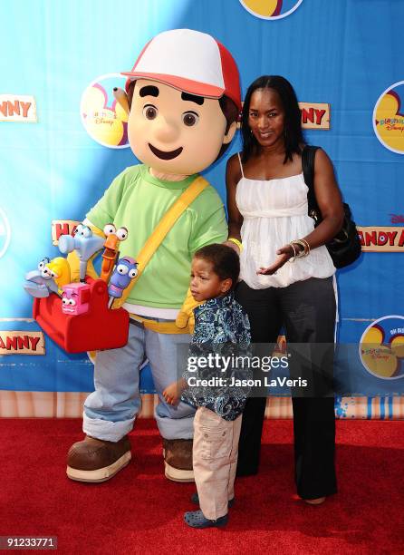 Actress Angela Bassett and her son Slater Vance attend the premiere of "Handy Manny Motorcycle Adventure" at ArcLight Cinemas on September 26, 2009...