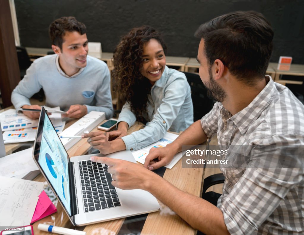 Associate Working On Line People Working Online At A Creative Office High-Res Stock Photo - Getty ...