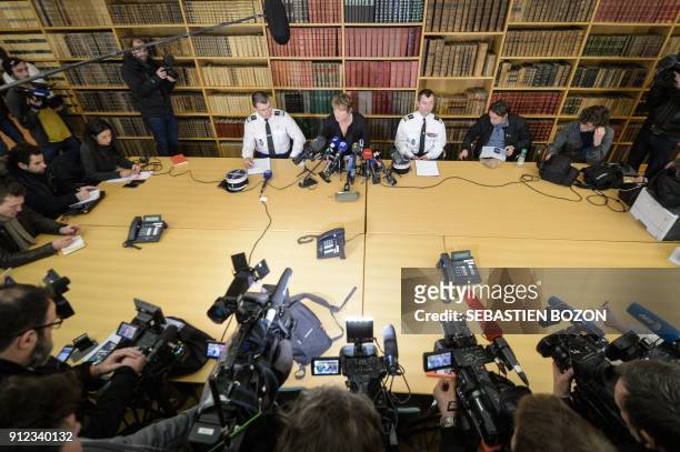 Besancon's state prosecutor Edwige Roux-Morizot gives a press conference flanked by Haute-Saone gendarmerie group commander Jean-Michel Blaudez and...