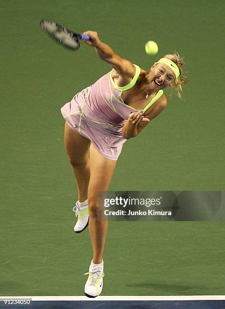 Maria Sharapova of Russia serves in her match against Samantha Stosur of Australia during day three of the Toray Pan Pacific Open Tennis tournament...