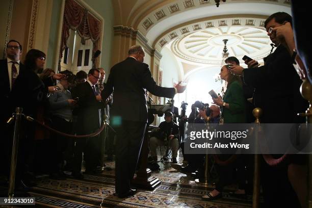 Senate Minority Leader Sen. Chuck Schumer speaks to members of the media during a news briefing after the weekly Senate Democratic Policy Luncheon...