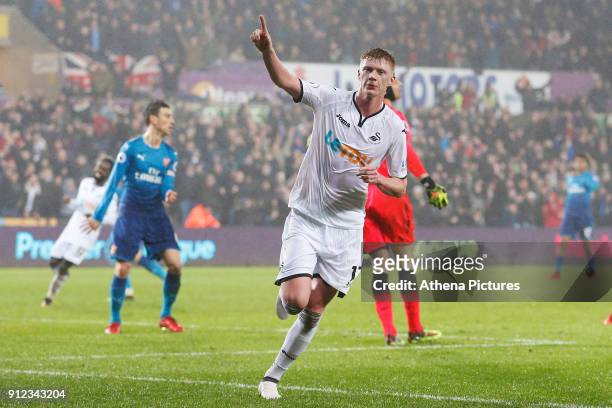 Sam Clucas of Swansea celebrates scoring his sides first goal of the match to equalise during the Premier League match between Swansea City and...