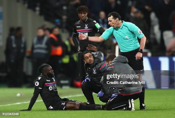 Bakary Sako of Crystal Palace recieves treatment following an injury during the Premier League match between West Ham United and Crystal Palace at...