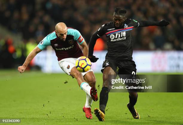 Pablo Zabaleta of West Ham United and Bakary Sako of Crystal Palace in action during the Premier League match between West Ham United and Crystal...