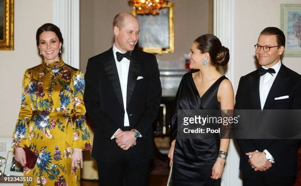 Catherine, Duchess of Cambridge, Prince William, Duke of Cambridge pose with Crown Princess Victoria of Sweden and Prince Daniel of Sweden as they...