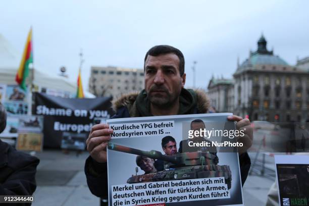About 25 mostly kurdish activists joined a small rally in Munich downtown, on January 30, 2018. They protested the turkish invasion in the kurdish...