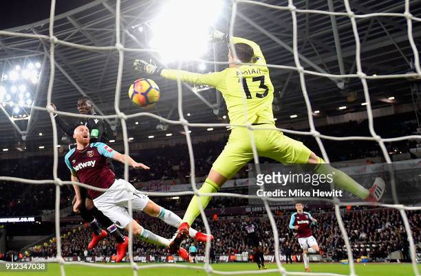 Christian Benteke of Crystal Palace scores his sides first goal during the Premier League match between West Ham United and Crystal Palace at London...