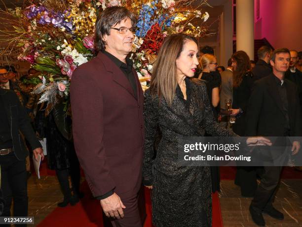 Pat Cleveland and husband Paul von Ravenstein during the Gianni Versace Retrospective opening event at Kronprinzenpalais on January 30, 2018 in...