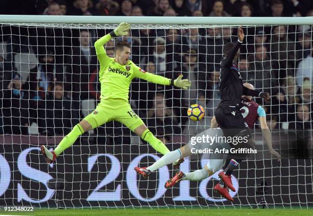 Christian Benteke of Crystal Palace scores during the Premier League match between West Ham United and Crystal Palace at London Stadium on January...