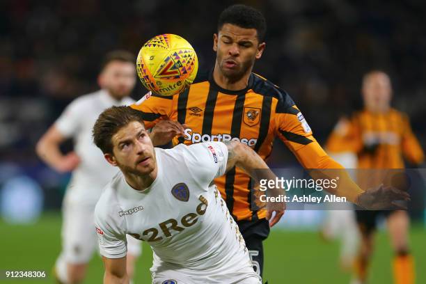 Fraizer Campbell of Hull City is held off by Gaetano Berardi of Leeds United during the Sky Bet Championship match between Hull City and Leeds United...