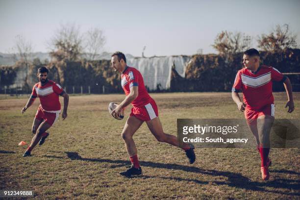 on rugby training - passing - sport stock pictures, royalty-free photos & images