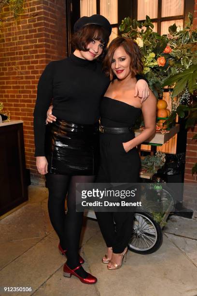 Gizzi Erskine and Caroline Flack attend the launch of The Tanqueray No. TEN Table at Dalloway Terrace hosted by Gizzi Erskine on January 30, 2018 in...