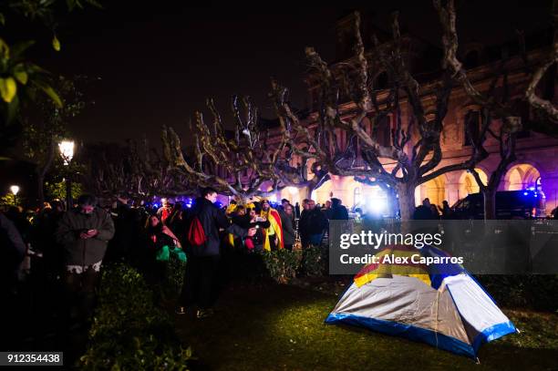 Demonstrators prepare to camp during a protest to support former Catalan President, Carles Puigdemont in front of the Parliament of Catalonia on...