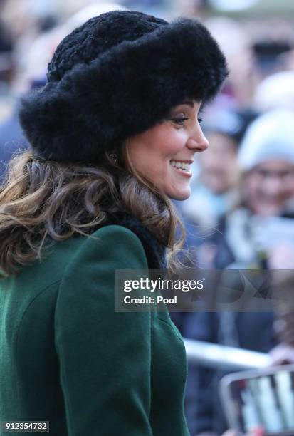 Catherine, Duchess of Cambridge walks through the cobbled streets of Stockholm from the Royal Palace to the Nobel Museum during day one of their...