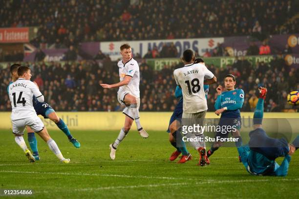 Samuel Clucas of Swansea City scores his sides third goal during the Premier League match between Swansea City and Arsenal at Liberty Stadium on...