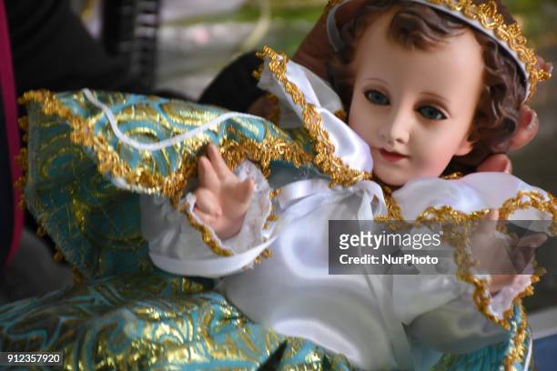 An child god is seen in a store in the center of Mexico City prior to the celebration of the traditional Holiday Day of the Candelaria on January 30,...