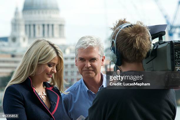 Holly Willoughby and Phillip Schofield are seen presenting 'This Morning' on September 29, 2009 in London, England.
