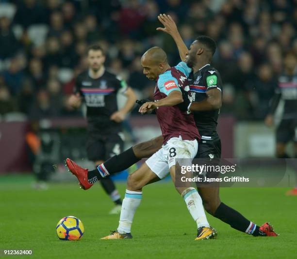 Joao Mario of West Ham United in action with Timothy Fosu-Mensah of Crystal Palace during the Premier League match between West Ham United and...